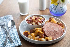 Ham Patty over Cheesy Potatoes and Cinnamon Apples