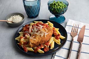 Chicken Parmesan over Pasta and Seasoned Vegetables